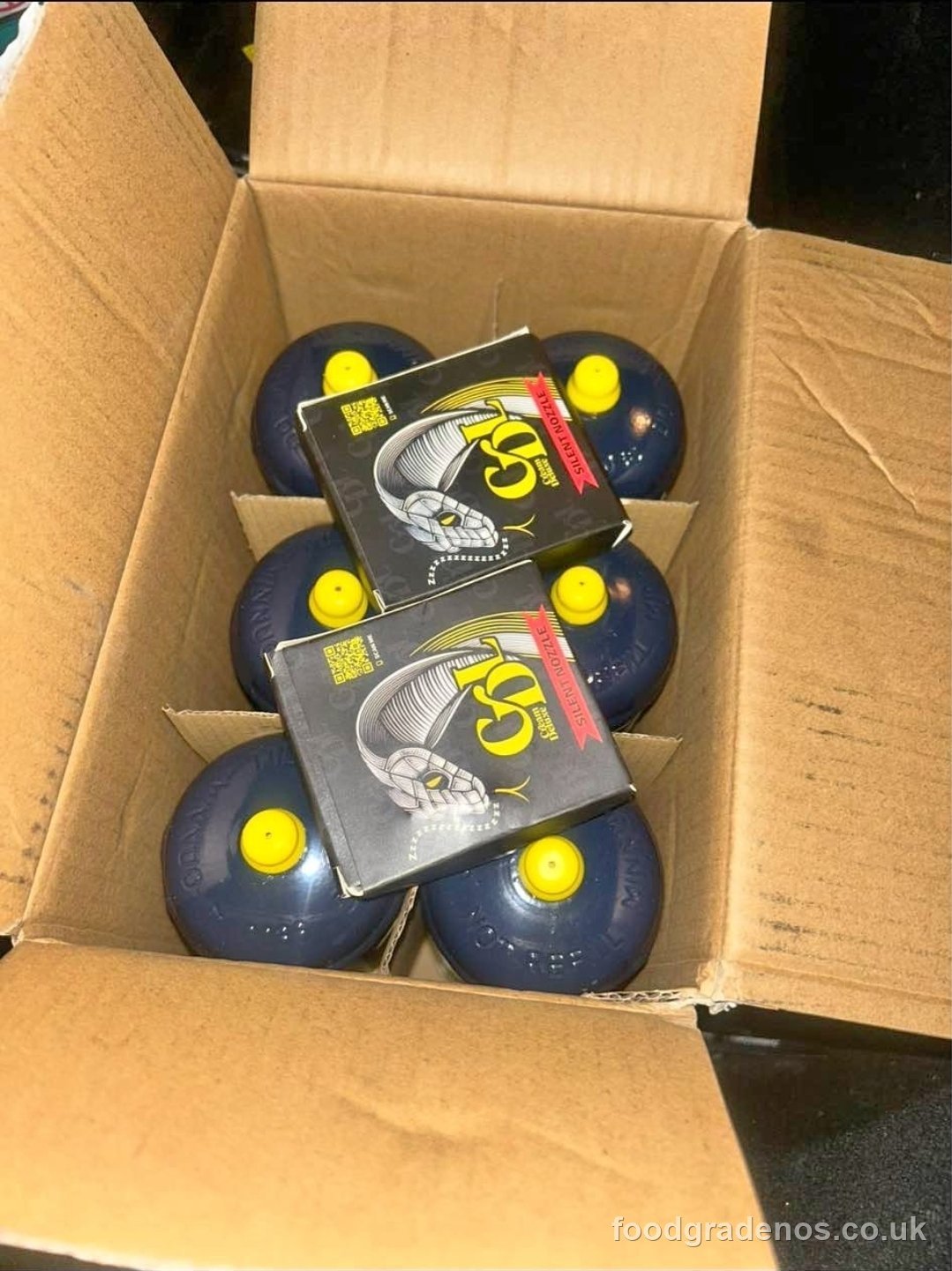 Food-grade nitrous cylinders packed and sealed in a labelled dispatch box